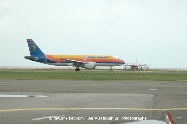 Air Jamaica Airline - Landing & Take Off - MBJ Airports Limited - Sangster International Airport - Domestic Terminal - Montego Bay, St James, Jamaica W.I. - MBJ Limited - Transforming Sangster International Airport into a world class facility - Photographs by Net2Market.com - Negril Travel Guide, Negril Jamaica WI - http://www.negriltravelguide.com - info@negriltravelguide.com...!