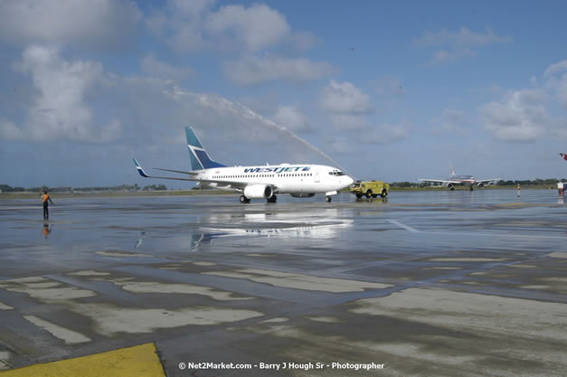 MBJ Airports Limited Welcomes WestJet Airlines - Inaugural Scheduled Service From Toronto Pearsons International Airport - Monday, December 10, 2007 - Sangster International Airport - MBJ Airports Limited, Montego Bay, Jamaica W.I. - Photographs by Net2Market.com - Barry J. Hough Sr, Photographer - Negril Travel Guide, Negril Jamaica WI - http://www.negriltravelguide.com - info@negriltravelguide.com...!