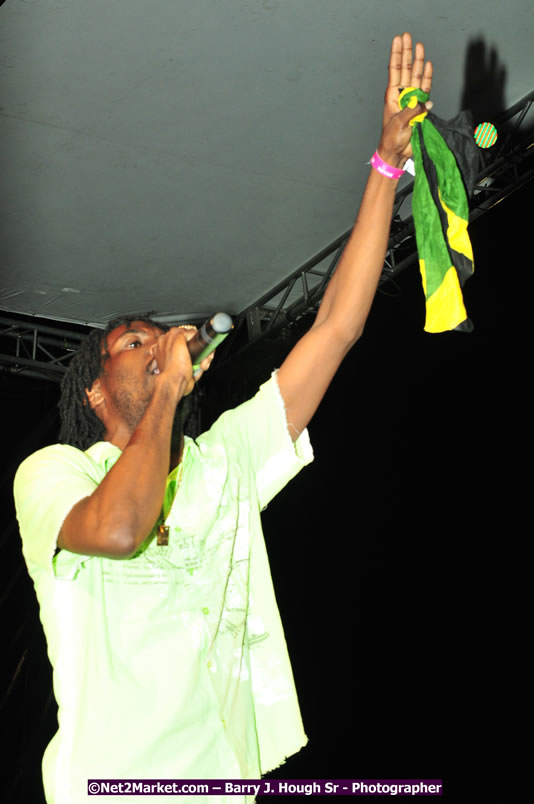 Usain Bolt of Jamaica - The Fastest Man In The World  - Usain Bolt Homecoming Celebrations Concert at the William Knibb High School Play Field, Trelawny - Ice, Ding Dong, Ravers Clavers, D'Angel, Voicemail, RDX and Dancers, Wayne Marshall, Tammi Chynn, Bugle, Nero, Tanya Stephens, Richie Spice, Kip Rich,and Shaggy - Photographs by Net2Market.com - Barry J. Hough Sr. Photojournalist/Photograper - Photographs taken with a Nikon D300 - Negril Travel Guide, Negril Jamaica WI - http://www.negriltravelguide.com - info@negriltravelguide.com...!