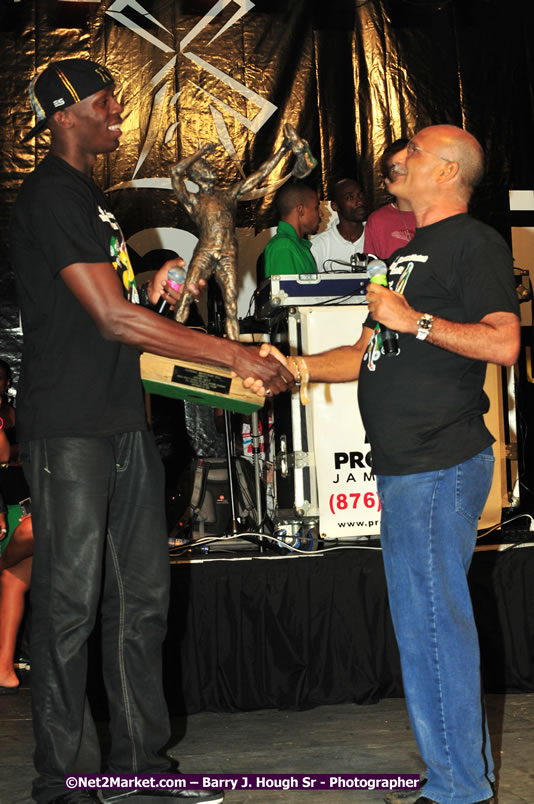 Usain Bolt of Jamaica - The Fastest Man In The World  - Usain Bolt Homecoming Celebrations Concert at the William Knibb High School Play Field, Trelawny - Ice, Ding Dong, Ravers Clavers, D'Angel, Voicemail, RDX and Dancers, Wayne Marshall, Tammi Chynn, Bugle, Nero, Tanya Stephens, Richie Spice, Kip Rich,and Shaggy - Photographs by Net2Market.com - Barry J. Hough Sr. Photojournalist/Photograper - Photographs taken with a Nikon D300 - Negril Travel Guide, Negril Jamaica WI - http://www.negriltravelguide.com - info@negriltravelguide.com...!